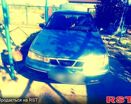 Синій Деу Нексія, об'ємом двигуна 1.5 л та пробігом 390 тис. км за 1100 $, фото 1 на Automoto.ua