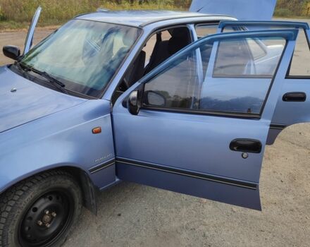 Синий Дэу Нексия, объемом двигателя 1.5 л и пробегом 84 тыс. км за 2739 $, фото 19 на Automoto.ua