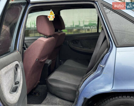 Синій Деу Нексія, об'ємом двигуна 1.5 л та пробігом 200 тис. км за 1050 $, фото 11 на Automoto.ua