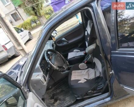 Синій Деу Нексія, об'ємом двигуна 1.5 л та пробігом 250 тис. км за 1301 $, фото 4 на Automoto.ua