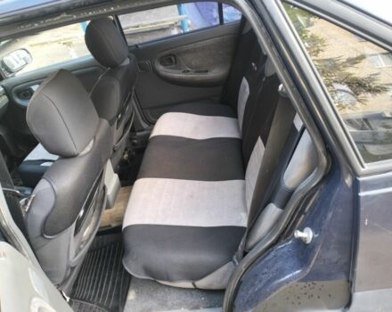 Синий Дэу Нексия, объемом двигателя 1.5 л и пробегом 250 тыс. км за 1301 $, фото 6 на Automoto.ua