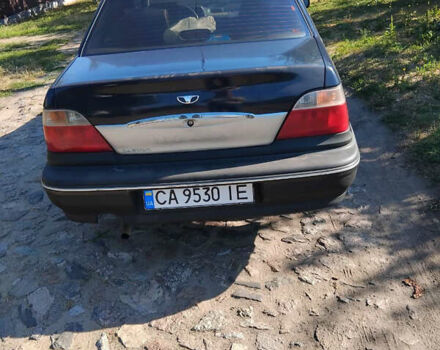 Синий Дэу Нексия, объемом двигателя 1.5 л и пробегом 205 тыс. км за 2100 $, фото 3 на Automoto.ua