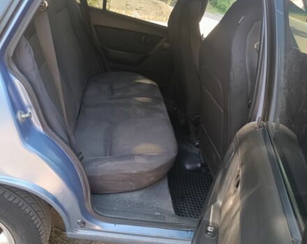 Синій Деу Нексія, об'ємом двигуна 1.5 л та пробігом 123 тис. км за 1999 $, фото 7 на Automoto.ua
