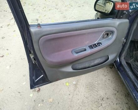 Синій Деу Нексія, об'ємом двигуна 1.5 л та пробігом 250 тис. км за 1301 $, фото 6 на Automoto.ua