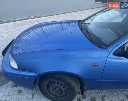 Синій Деу Нексія, об'ємом двигуна 1.5 л та пробігом 244 тис. км за 1700 $, фото 2 на Automoto.ua