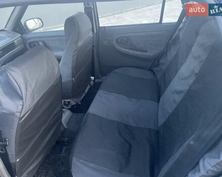 Синій Деу Нексія, об'ємом двигуна 1.5 л та пробігом 244 тис. км за 1700 $, фото 14 на Automoto.ua