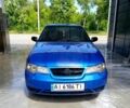 Синій Деу Нексія, об'ємом двигуна 1.5 л та пробігом 230 тис. км за 1550 $, фото 1 на Automoto.ua