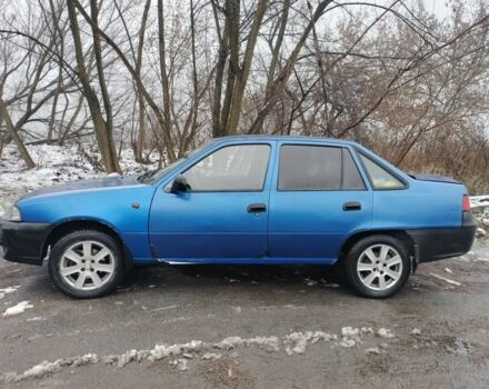 Синий Дэу Нексия, объемом двигателя 1.5 л и пробегом 250 тыс. км за 1500 $, фото 2 на Automoto.ua