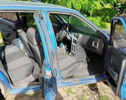 Синій Деу Нексія, об'ємом двигуна 1.5 л та пробігом 172 тис. км за 1000 $, фото 2 на Automoto.ua