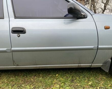 Синій Деу Нексія, об'ємом двигуна 1.6 л та пробігом 204 тис. км за 1350 $, фото 9 на Automoto.ua