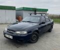 Синій Деу Нексія, об'ємом двигуна 1.5 л та пробігом 244 тис. км за 699 $, фото 1 на Automoto.ua