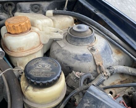 Синій Деу Нексія, об'ємом двигуна 1.5 л та пробігом 244 тис. км за 699 $, фото 14 на Automoto.ua