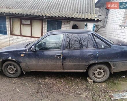 Синій Деу Нексія, об'ємом двигуна 1.5 л та пробігом 100 тис. км за 700 $, фото 1 на Automoto.ua