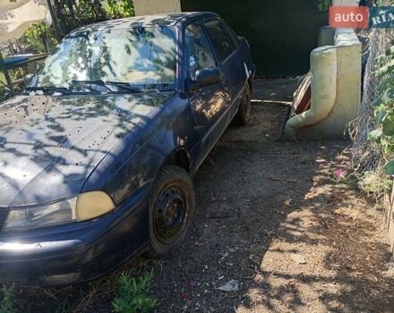 Синій Деу Нексія, об'ємом двигуна 1.5 л та пробігом 200 тис. км за 606 $, фото 1 на Automoto.ua