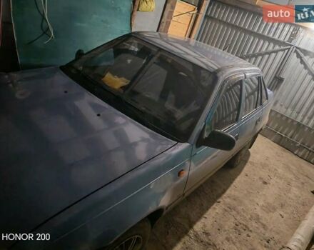 Синий Дэу Нексия, объемом двигателя 1.5 л и пробегом 158 тыс. км за 1700 $, фото 1 на Automoto.ua