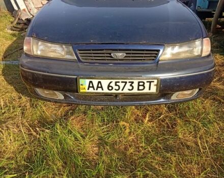 Синій Деу Нексія, об'ємом двигуна 1 л та пробігом 324 тис. км за 1100 $, фото 1 на Automoto.ua