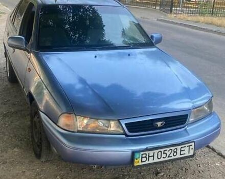 Синій Деу Нексія, об'ємом двигуна 1.6 л та пробігом 250 тис. км за 1100 $, фото 1 на Automoto.ua
