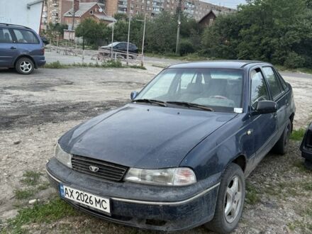Деу Нексія 2007 у Харкові на Automoto.ua Синій Деу Нексія, об'ємом двигуна 1.6 л та пробігом 240 тис. км за 400 $, фото 1 на Automoto.ua