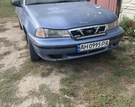 Синий Дэу Нексия, объемом двигателя 1.5 л и пробегом 250 тыс. км за 600 $, фото 1 на Automoto.ua