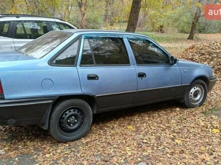 Синій Деу Нексія, об'ємом двигуна 1.5 л та пробігом 246 тис. км за 2000 $, фото 1 на Automoto.ua