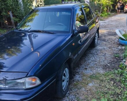 Синій Деу Нексія, об'ємом двигуна 1.6 л та пробігом 204 тис. км за 1500 $, фото 1 на Automoto.ua