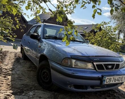 Синий Дэу Нексия, объемом двигателя 1.5 л и пробегом 243 тыс. км за 451 $, фото 1 на Automoto.ua
