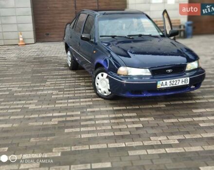 Синий Дэу Нексия, объемом двигателя 1.5 л и пробегом 235 тыс. км за 699 $, фото 1 на Automoto.ua