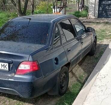 Синий Дэу Нексия, объемом двигателя 1.5 л и пробегом 255 тыс. км за 1100 $, фото 1 на Automoto.ua