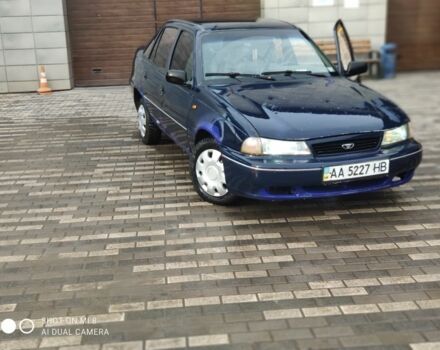 Синий Дэу Нексия, объемом двигателя 1.5 л и пробегом 234 тыс. км за 699 $, фото 1 на Automoto.ua