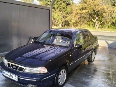 Синій Деу Нексія, об'ємом двигуна 1.5 л та пробігом 250 тис. км за 1301 $, фото 1 на Automoto.ua