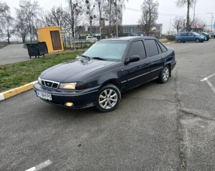 Синій Деу Нексія, об'ємом двигуна 1.5 л та пробігом 107 тис. км за 2000 $, фото 1 на Automoto.ua