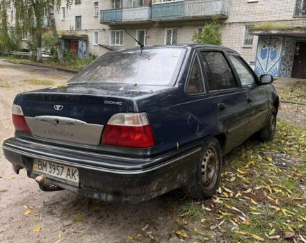 Синий Дэу Нексия, объемом двигателя 1.5 л и пробегом 216 тыс. км за 600 $, фото 1 на Automoto.ua