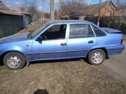 Синій Деу Нексія, об'ємом двигуна 1.5 л та пробігом 295 тис. км за 991 $, фото 1 на Automoto.ua