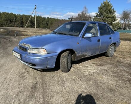 Синий Дэу Нексия, объемом двигателя 1.5 л и пробегом 247 тыс. км за 411 $, фото 1 на Automoto.ua