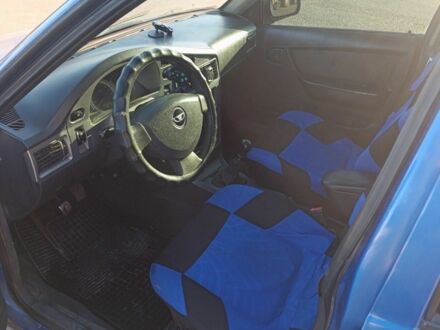 Синій Деу Нексія, об'ємом двигуна 1.6 л та пробігом 230 тис. км за 2000 $, фото 1 на Automoto.ua