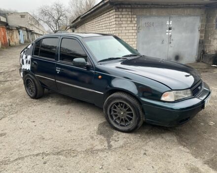 Зеленый Дэу Нексия, объемом двигателя 1.5 л и пробегом 208 тыс. км за 1300 $, фото 8 на Automoto.ua