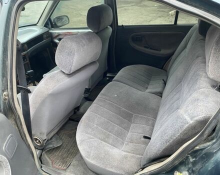 Зеленый Дэу Нексия, объемом двигателя 1.5 л и пробегом 208 тыс. км за 1300 $, фото 6 на Automoto.ua