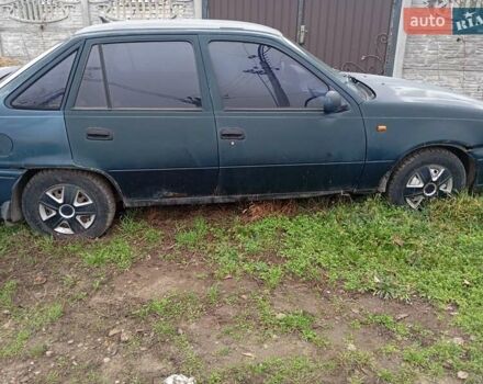 Зеленый Дэу Нексия, объемом двигателя 1.5 л и пробегом 300 тыс. км за 591 $, фото 2 на Automoto.ua