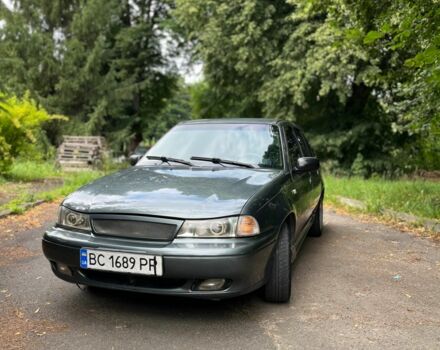 Зелений Деу Нексія, об'ємом двигуна 1.5 л та пробігом 290 тис. км за 999 $, фото 2 на Automoto.ua