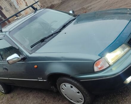 Зелений Деу Нексія, об'ємом двигуна 1 л та пробігом 350 тис. км за 854 $, фото 1 на Automoto.ua