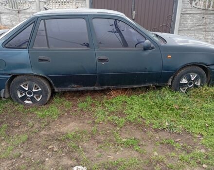 Зеленый Дэу Нексия, объемом двигателя 1.5 л и пробегом 300 тыс. км за 591 $, фото 3 на Automoto.ua
