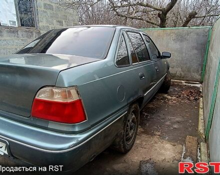 Зеленый Дэу Нексия, объемом двигателя 1.5 л и пробегом 331 тыс. км за 2300 $, фото 2 на Automoto.ua