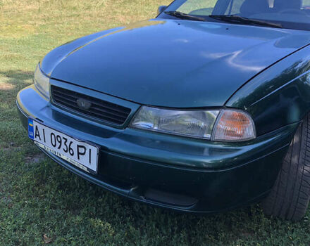 Зеленый Дэу Нексия, объемом двигателя 1.5 л и пробегом 470 тыс. км за 1100 $, фото 6 на Automoto.ua