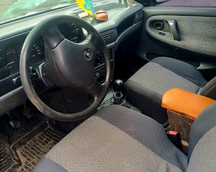 Зеленый Дэу Нексия, объемом двигателя 1.5 л и пробегом 331 тыс. км за 2300 $, фото 6 на Automoto.ua