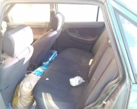 Зелений Деу Нексія, об'ємом двигуна 1.5 л та пробігом 150 тис. км за 1447 $, фото 5 на Automoto.ua