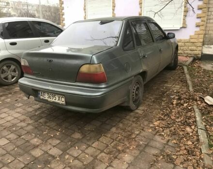 Зеленый Дэу Нексия, объемом двигателя 1.5 л и пробегом 232 тыс. км за 1018 $, фото 3 на Automoto.ua