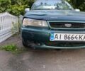 Зелений Деу Нексія, об'ємом двигуна 1.5 л та пробігом 300 тис. км за 1000 $, фото 10 на Automoto.ua