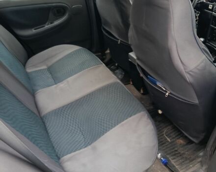 Зеленый Дэу Нексия, объемом двигателя 1.5 л и пробегом 330 тыс. км за 1000 $, фото 3 на Automoto.ua