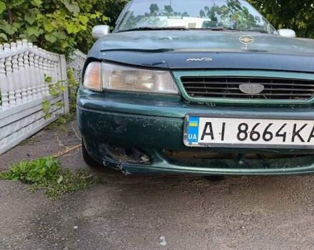 Зелений Деу Нексія, об'ємом двигуна 1.5 л та пробігом 300 тис. км за 1000 $, фото 8 на Automoto.ua