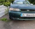 Зелений Деу Нексія, об'ємом двигуна 1.5 л та пробігом 300 тис. км за 1000 $, фото 8 на Automoto.ua